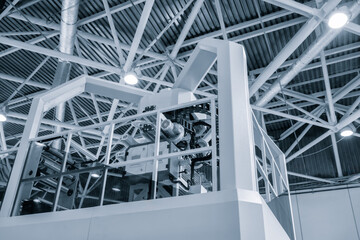 Industrial machine for production and printing of polyethylene bags. Industrial concept background