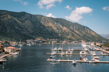 Kotor city harbor with sailboats and mountains. Montenegro. 