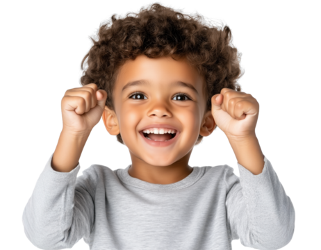 Young boy expressing joy with raised fists against a transparent background, showcasing happiness and excitement
