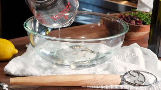 Baking three olive bread filled with different types of olives. Baking bread with ingredients like flour, yeast, salt, water and sugar.  Fresh baked rustic bread. 