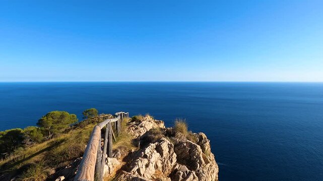 Fence in front of Torre Vigia De Cerro Gordo, a watchtower looking out for any marauding pirates. La Herradura, Andulasia, Southern Spain