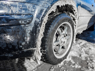 Icicles Are Forming under a Car wheel arch Harsh Winter Conditions and Cold Environments