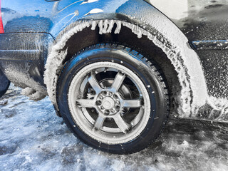Icicles Are Forming under a Car wheel arch Harsh Winter Conditions and Cold Environments