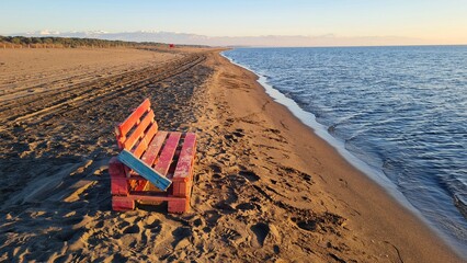Wooden bench on the seashore