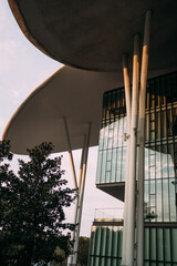 Obraz premium a modern architectural building with glass and curved structures