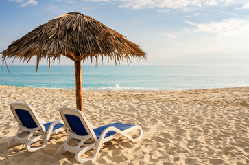 Sun loungers on the beach in the morning, Cayo Santa Maria, Cuba