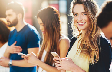 Phone, group and woman with friends in city for college freshman, networking and social media. Viral post, streaming and communication with people and mobile app outdoors for trendy and online news