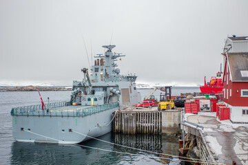 Danish nautical military force patrol war ship, docked at pier in Nuuk city, Greenland