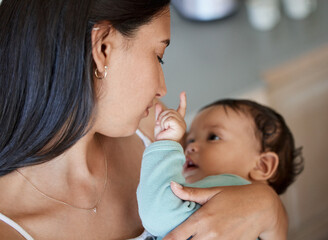 Comfort, mother and bonding with baby in home for connection, child development and cuddle. Love,...