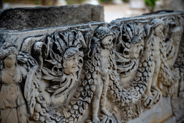 Statues, sarcophagi and other artifacts from the ancient city of Perge are exhibited in the Antalya Museum. Rows of columns in Perge, Antalya, Turkey. Remains of colonnaded street in Pamphylian ancien