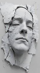 A cracked plaster relief of a serene human face, evoking themes of fragility and identity.