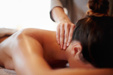 Woman, hands or relax with neck massage at spa for physical therapy or body treatment at resort....