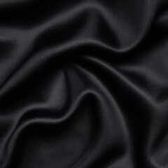 Obraz premium Dark silky fabric with elegant draped folds and soft texture