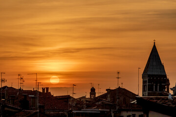 Silhouette of the city of Venice during sunset (golden hour) in the fall