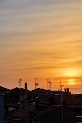 Silhouette of the city of Venice during sunset (golden hour) in the fall