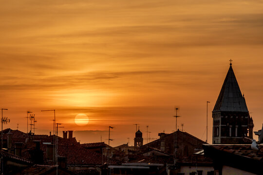 Silhouette of the city of Venice during sunset (golden hour) in the fall