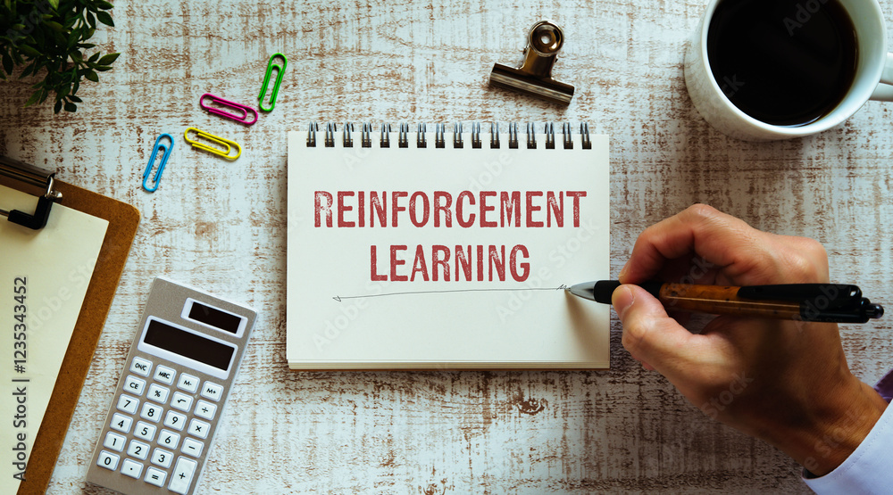 Poster there is notebook with the word reinforcement learning. it is as an eye-catching image.