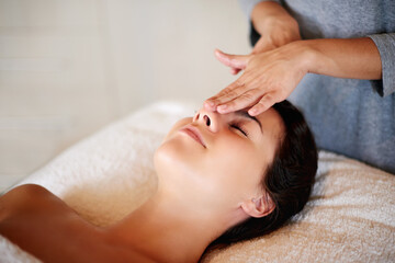 Naklejka premium Massage, facial and masseuse for therapy at spa, beauty treatment and holistic healing with skincare. Woman, luxury resort and client pressure at salon, cosmetic service and smooth or soft skin