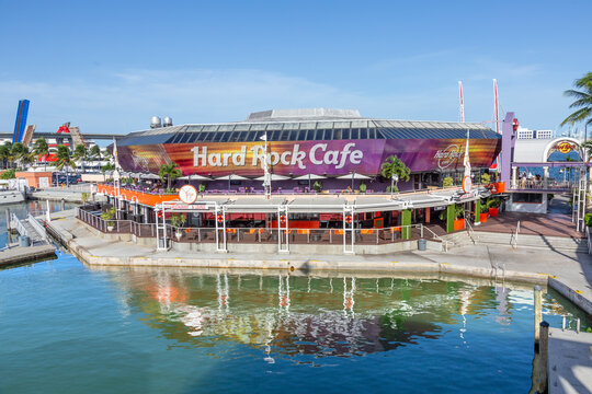 Hardrock cafe downtown Miami with reflection in harbor.