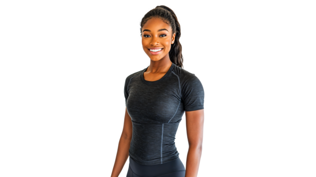 portrait of a female fitness trainer in a fitted t-shirt and leggings, smiling confidently