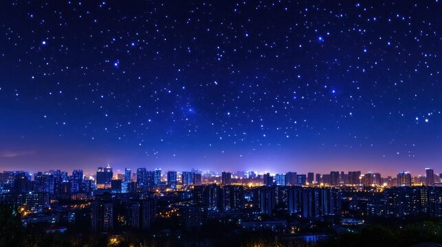 Nighttime cityscape with a starry sky above - Powered by Adobe