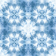 A blue and white tie dye pattern with snowflakes
