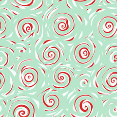 Fototapeta premium A green and red patterned fabric with a spiral design