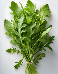 A fresh bunch of arugula, with vibrant green leaves and a tied brown twine, rests on a textured white surface
