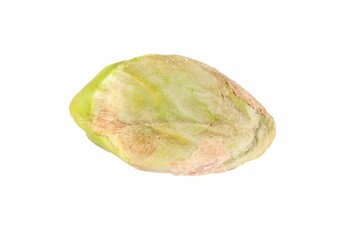 One peeled pistachio nut isolated on white