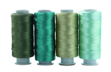 Spools of colorful sewing threads isolated on white