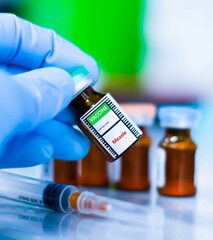 Vaccine bottles and syringes for injection preventing measle.