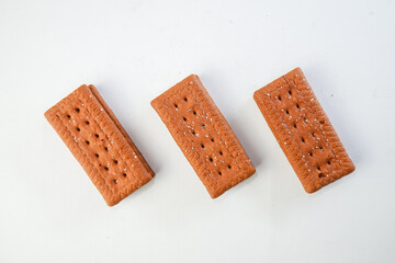 Crispy Chocolate Layered Biscuits on a White Background. Flat lay