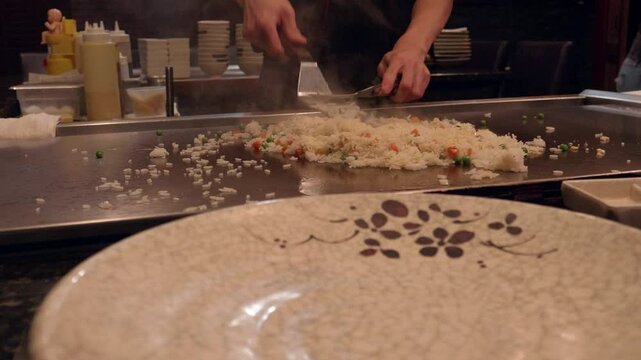 Teppanyaki Japanese Chef Making Fried Rice