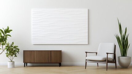 A minimalist interior featuring a light-colored wall, a large abstract artwork, a stylish chair, and greenery creating a serene living space.