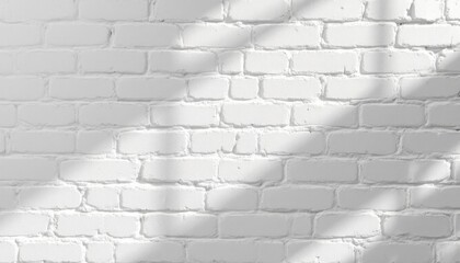 Shadowed white brick wall with subtle texture in sunlight