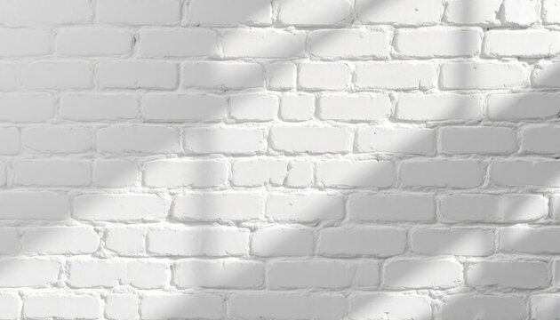 Fototapeta Shadowed white brick wall with subtle texture in sunlight