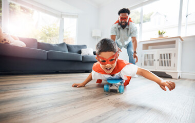 Father, child and superhero costume in home for flying on skateboard or playing fantasy games together. Dad, boy and happy kid in cosplay character mask for bonding in living room in family house - obrazy, fototapety, plakaty