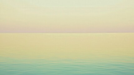 Fototapeta premium Tranquil Seascape with Soft Pastel Colors at Sunrise or Sunset