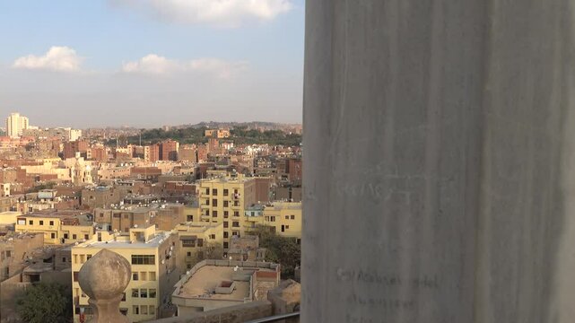 Cairo, Egypt A skyline view of downtown and Old Cairo from atop a minaret at the Ibn Tulun Mosque.
