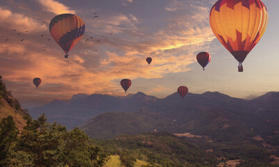 Stunning Hot Air Balloons Floating Gracefully Over a Beautiful Scenic Mountain Landscape