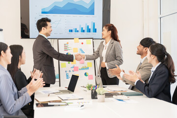 Asian business group meeting to give advice on graphing and document work in the office