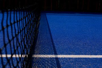 Detail of the net and surface of a paddle court