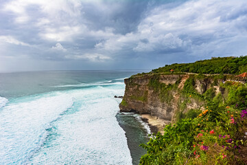 Beautiful sunset scenery of Uluwatu cliff in Bali, Indonesia