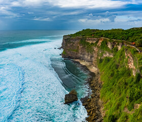Beautiful sunset scenery of Uluwatu cliff in Bali, Indonesia