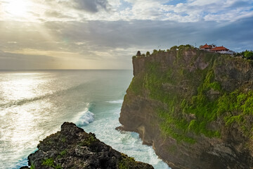 Beautiful sunset scenery of Uluwatu cliff in Bali, Indonesia