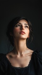 Portrait of a Pensive Young Woman with Soft Lighting and Elegance