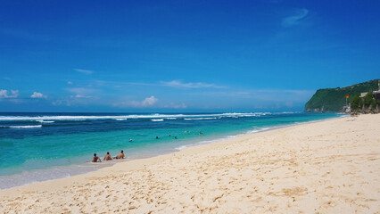 Melasti Beach is beautiful with white sand and blue sea water at sunny day