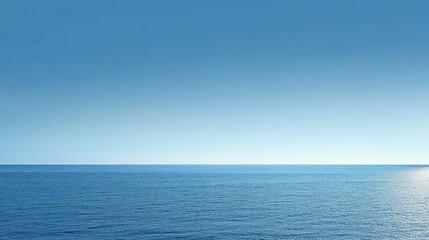 Obraz premium Calm Ocean Horizon with Blue Sky background
