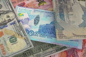 Banknotes of Kazakhstani tenge and US dollar. Cash. Financial concept.
