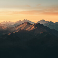 Naklejka premium Golden Hour Mountains: Majestic mountain range bathed in the warm, golden light of sunrise or sunset, creating a breathtaking panorama of peaks and valleys. 